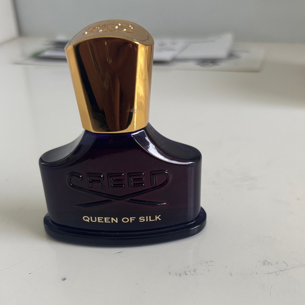 Creed Fragrance in Dark Purple with Gold Cap